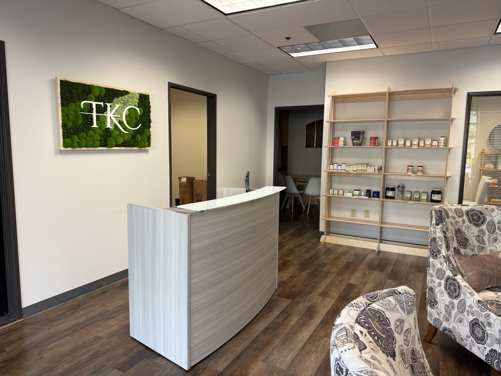 The TKC moss wall above the reception desk at the Karlfeldt Center