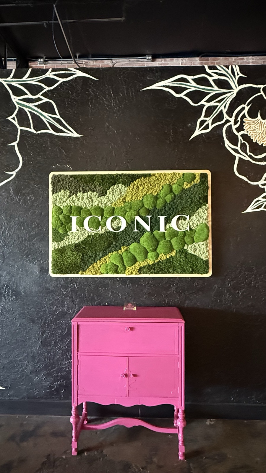 Framed preserved moss panel with ICONIC lettering at Iconic Event Center